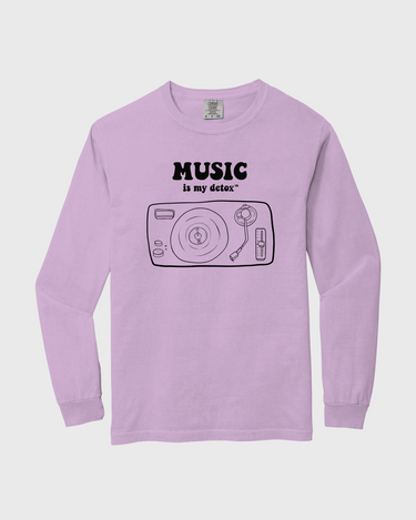 Purple long-sleeve shirt with music-themed graphic and text