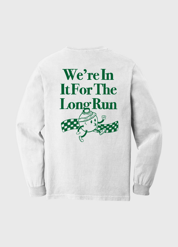 White sweatshirt with green text and graphic on a white background