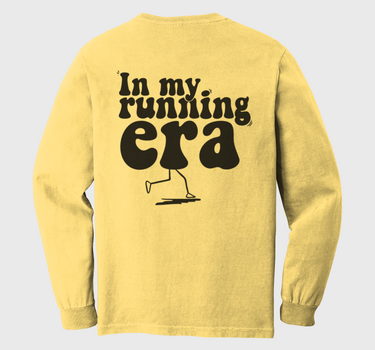 Yellow long-sleeve shirt with 'In my running era' text and graphic 