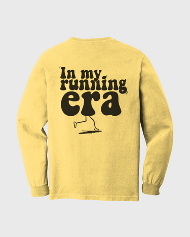Yellow long-sleeve shirt with 'In my running era' text and graphic 