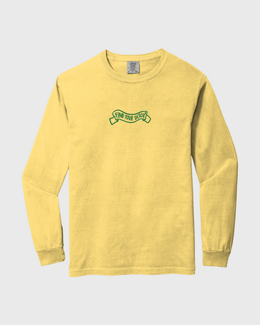 Yellow long-sleeve shirt with a logo on a light gray background