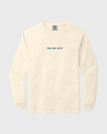 Beige long-sleeve shirt with blue text FIND YOUR DETOX