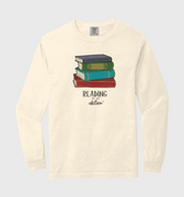 Long-sleeve shirt with a graphic of books and text on a white background