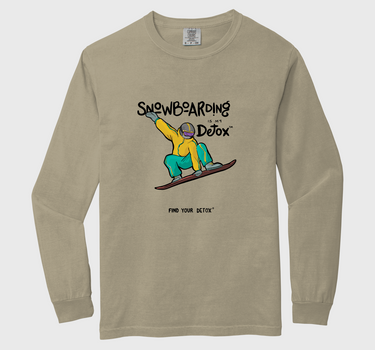 Beige long-sleeve shirt with snowboarding graphic on a white background