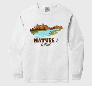 white long-sleeve tshirt with an image of mountains and river with brown text